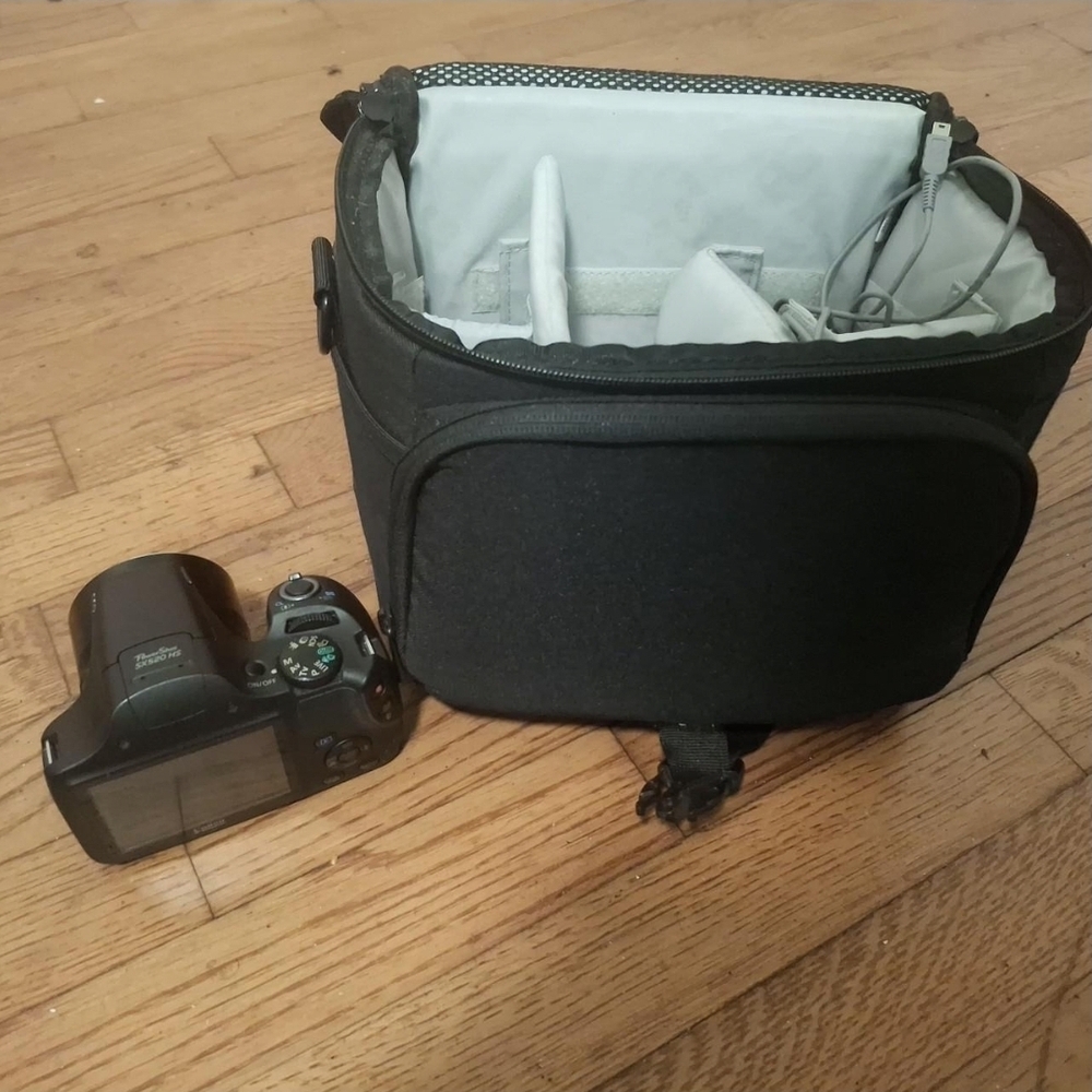 Compact Black Camera with Carrying Case